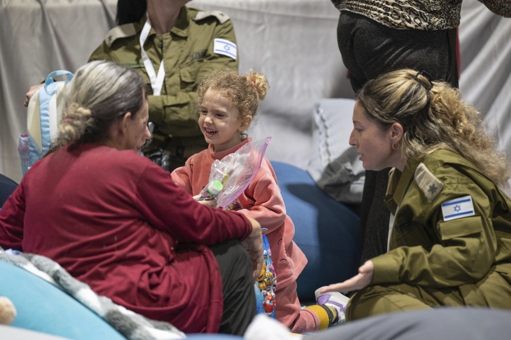 This handout photo provided by the Israel Prime Minister Office shows Yahel Shoham, 3 years old, upon her arrival in Israel after being freed. Yahel was one of the 13 Israeli hostages that Hamas released late Saturday, Nov. 25, 2023, in the second round of swaps under a cease-fire deal.