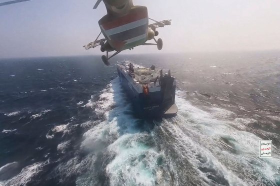 a Houthi forces helicopter approaching the cargo ship Galaxy Leader