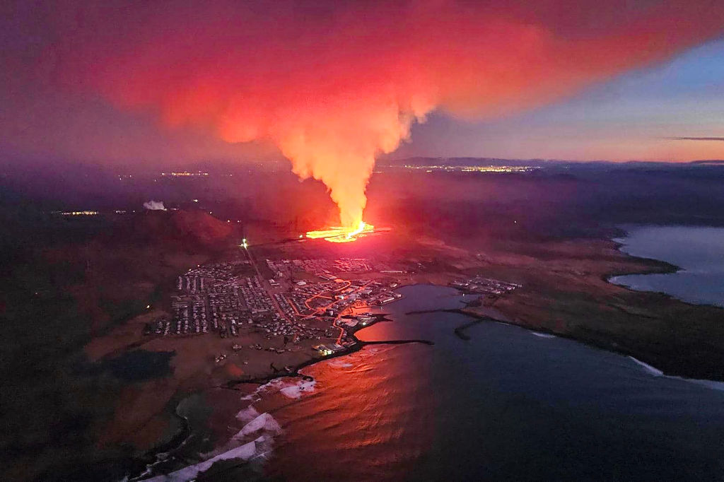 Billowing smoke and flowing lava are seen in this Icelandic Department of Civil Protection and Emergency Management, Jan. 14, 2024.