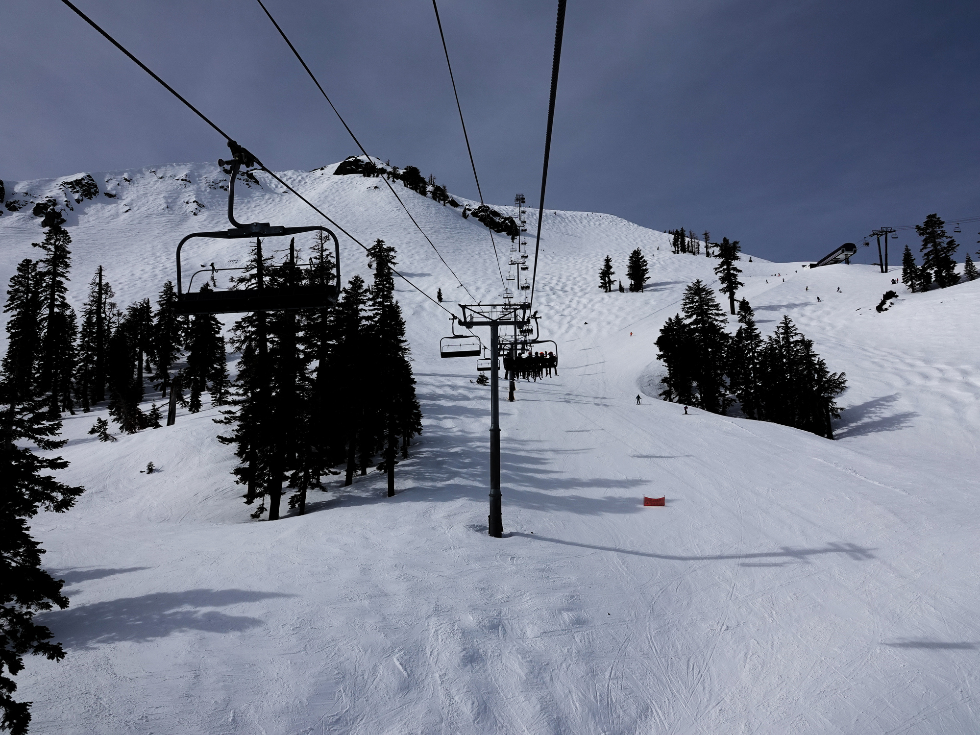 Ski lift view of Palisades Tahoe ski resort, California.