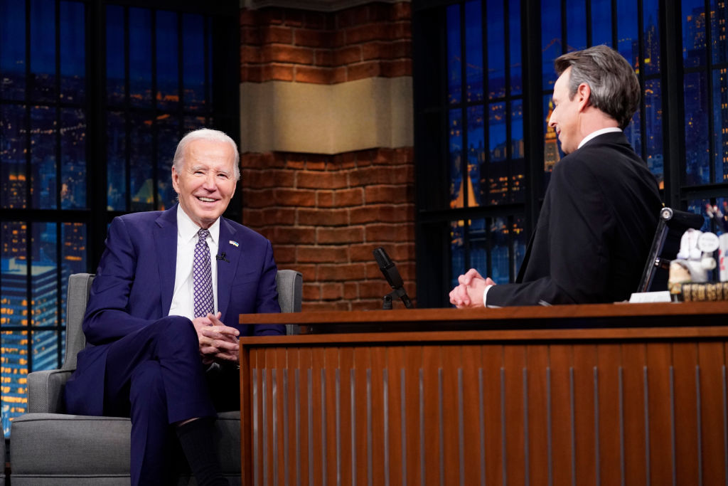 President Joe Biden talks with host Seth Meyers in 