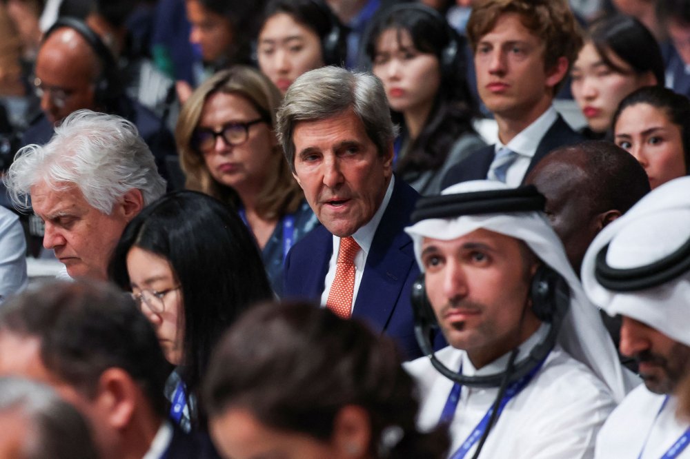 President Joe Biden delivers remarks as John Kerry listens during a virtual Leaders Summit on Climate with 40 world leaders at the White House on April 22, 2021.