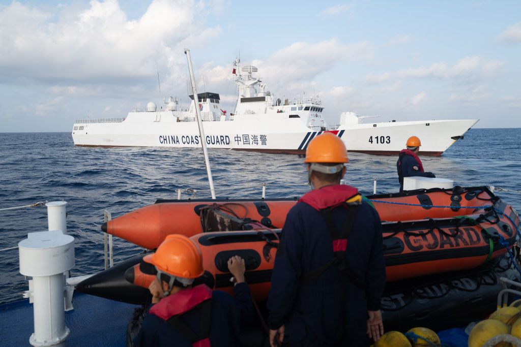 Chinese Coast Guard vessels execute a dangerous maneuver against the civilian supply boat Unaizah during a regular resupply mission at the contested Second Thomas Shoal (Ayungin Shoal) in the South China Sea, China on March 23, 2024.