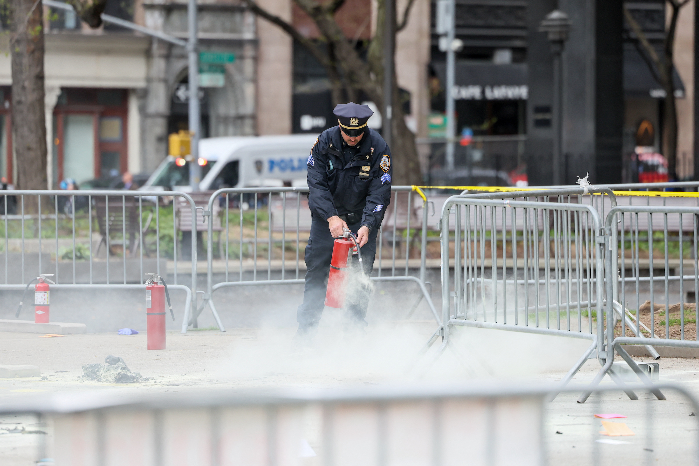 Aftermath of a person covered in flames outside NY courthouse of former U.S. President Trump's criminal hush money trial