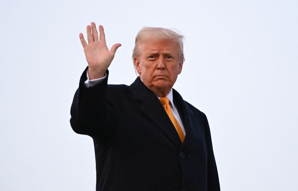 President Donald Trump waves as he boards Air Force One at Joint Base Andrews, Md. on March 7, 2025.