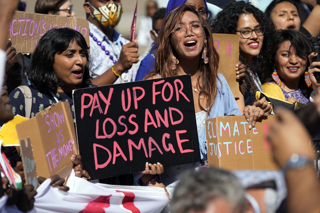 Fridays for Future protest calls for money for climate action at the COP27 U.N. Climate Summit, Nov. 11, 2022, in Sharm el-Sheikh, Egypt. 