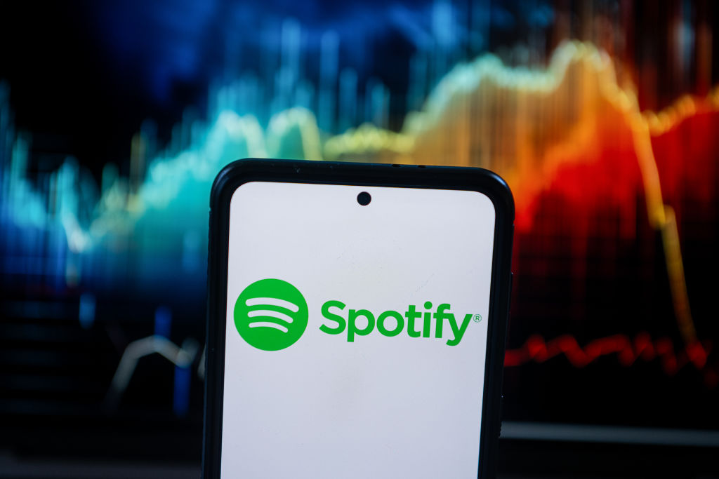 Dalam foto ilustrasi logo Spotify dipaparkan pada