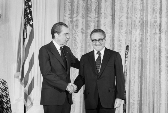 Nixon Shakes Hands with Kissinger