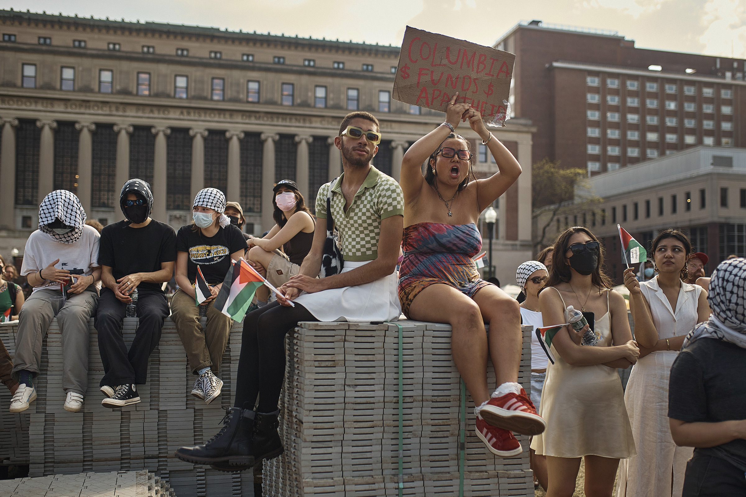 Protestors listen to a speaker during a pro-Palestinian encampment on Columbia University campus, advocating for financial disclosure and divestment from all companies tied to Israel and calling for a permanent ceasefire in Gaza., on April 29.