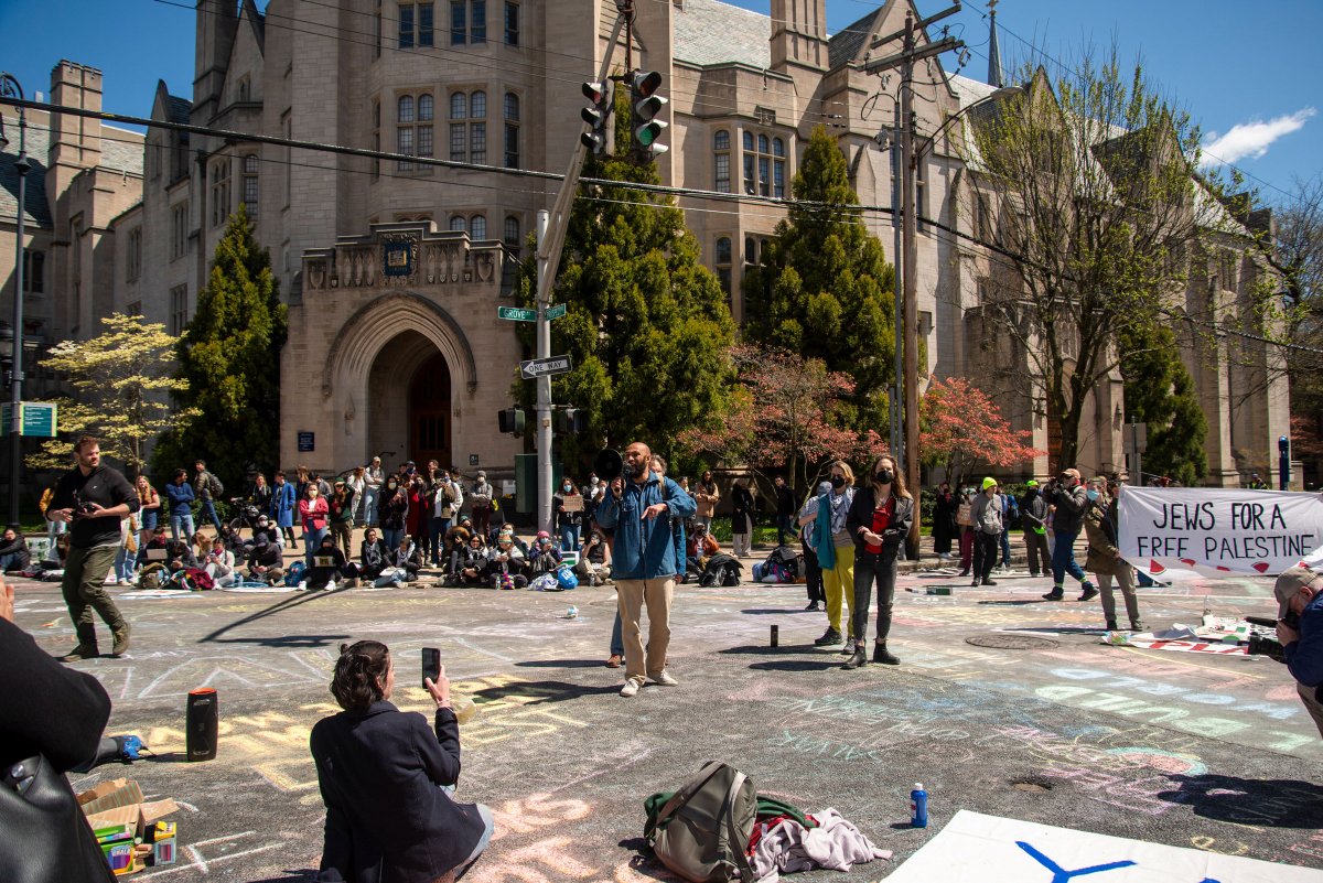 Pro-Palestinian protesters gather at a street intersection at Yale University in New Haven, Conn., on April 22, 2024.