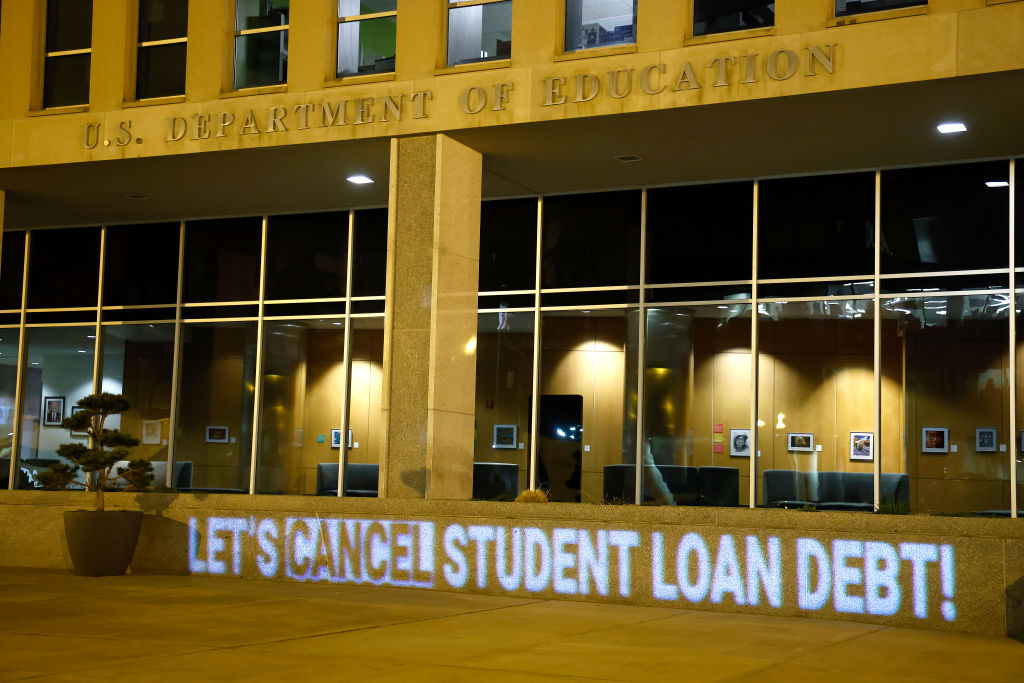 On The Second Anniversary Of The Student Loan Payment Pause Activists Project A Message Celebrating The Pause And Asking Secretary Cardona To Cancel Student Debt