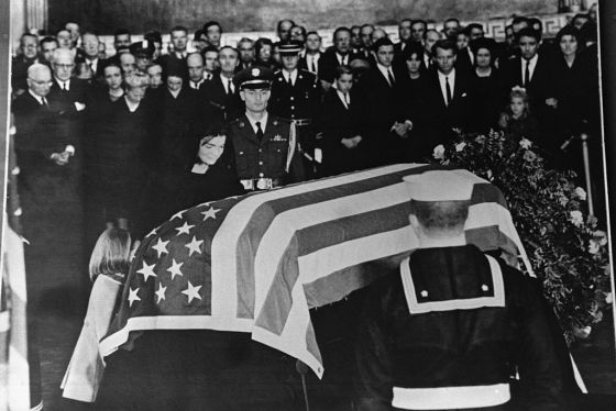 Jacqueline and Caroline Kennedy Kneeling at John F. Kennedy's Casket