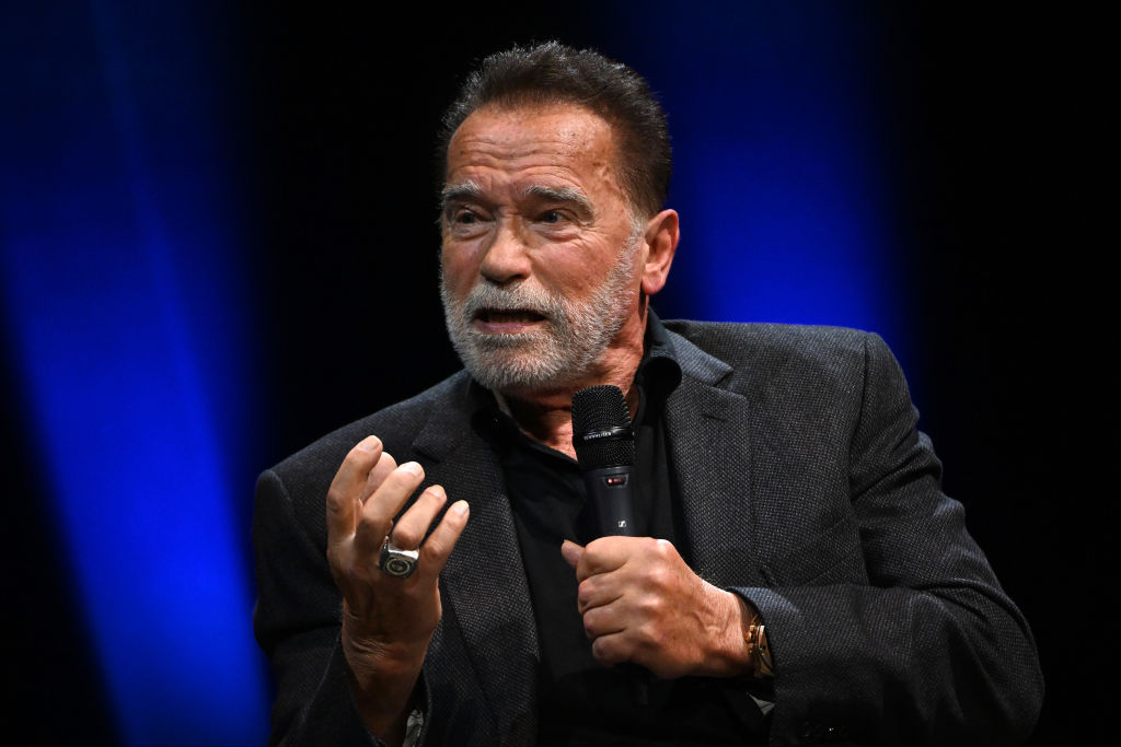 Arnold Schwarzenegger speaks onstage at an Evening with Arnold Schwarzenegger presented by Fane at London Palladium on October 24, 2023 in London, England.