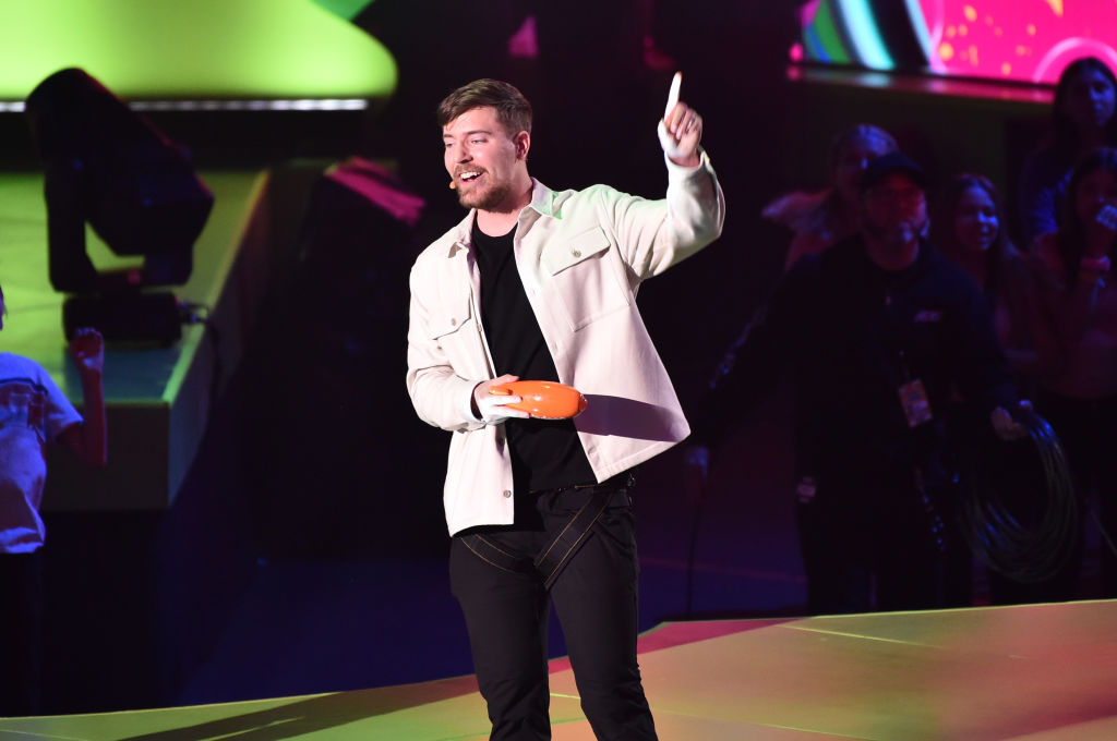 MrBeast holding a Kid's Choice Award onstage