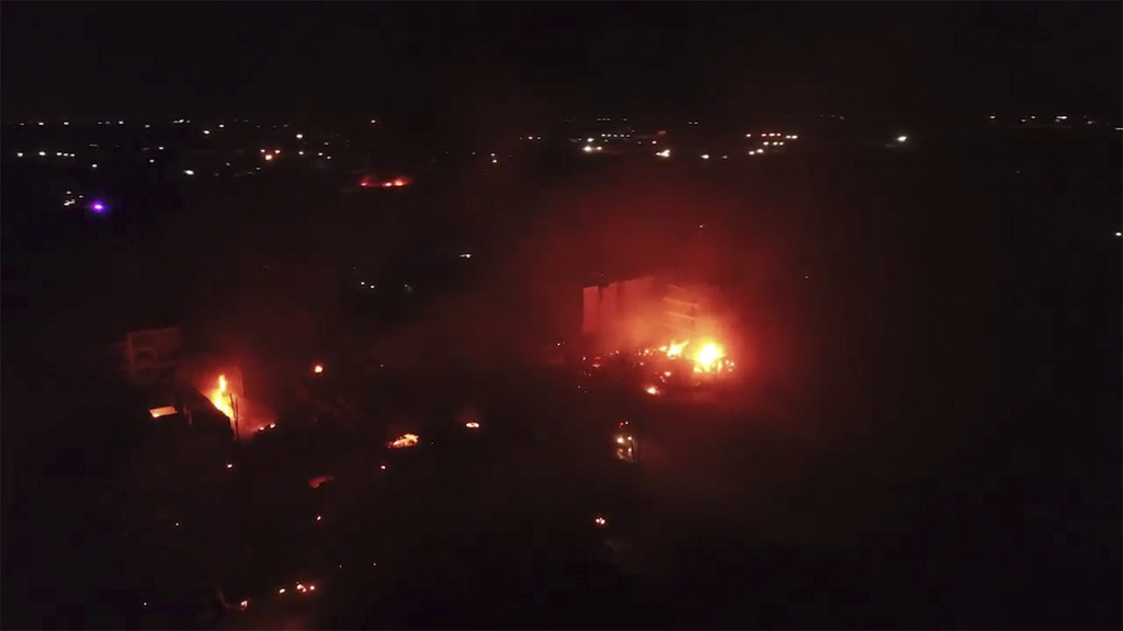 This aerial image made from drone video shows fires in Nairobi, Kenya, Friday, Feb. 2, 2024. Several explosions culminating in one huge plume of smoke rising above residential flats in Nairobi early on Friday started as a company refilled its gas tanks, according to a Kenyan government official.