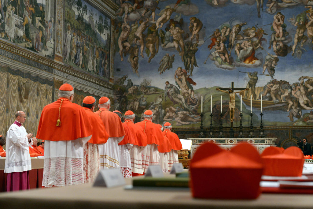 Cardinals attend the Conclave for the election of a new Pope at the Sistine Chapel in Vatican City, Vatican, on March 12, 2013.