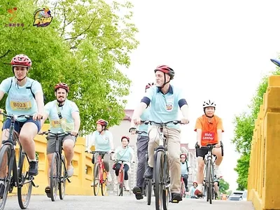 Expats cycling through Zhuqiao town