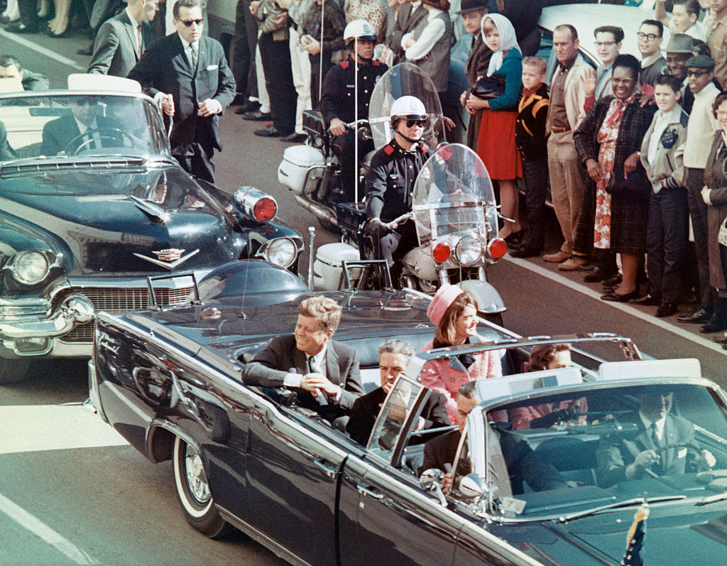 JFK and Jackie Kennedy riding in Dallas motorcade just before the assassination