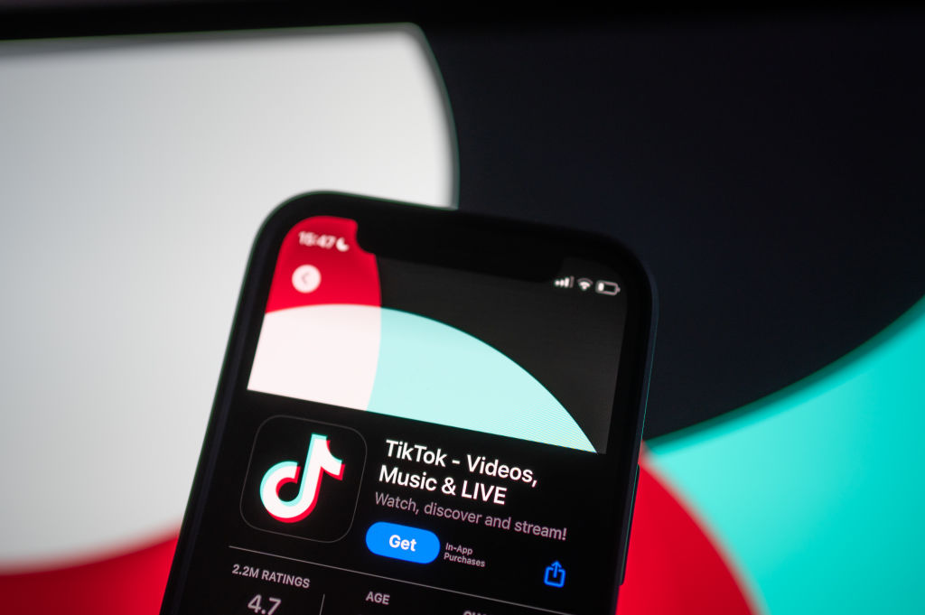 In this photo illustration the TikTok app is displayed on a