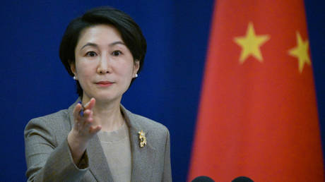 China says it will not be pushed around on Russia stance