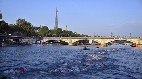 High bacteria levels could force cancellation of Paris Olympic swimming event in Seine River
