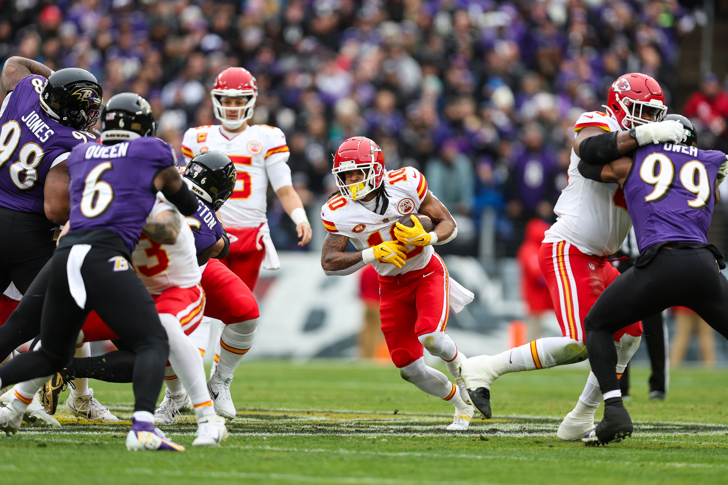 Isiah Pacheco runs the ball during the AFC Championship game against the Baltimore Ravens on Jan. 28, 2024.