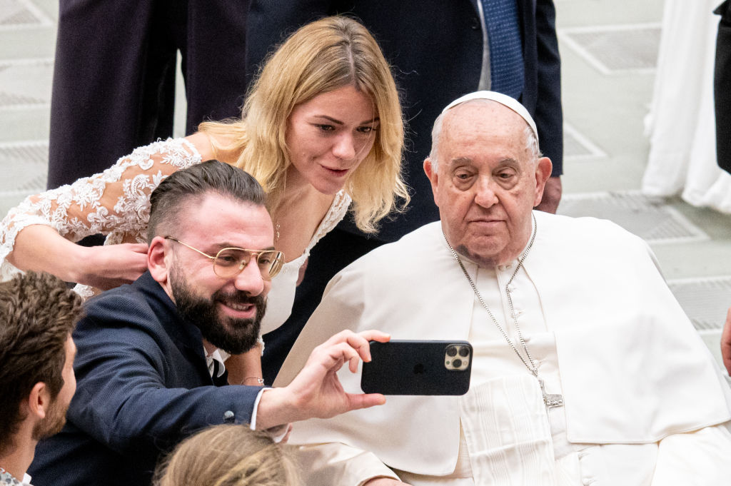 Pope Francis takes a selfie during his weekly general audience