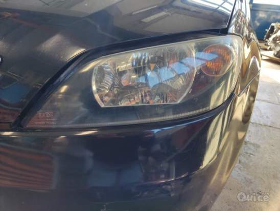 Proiettore sinistro MAZDA 2  del 2004 foto-265562