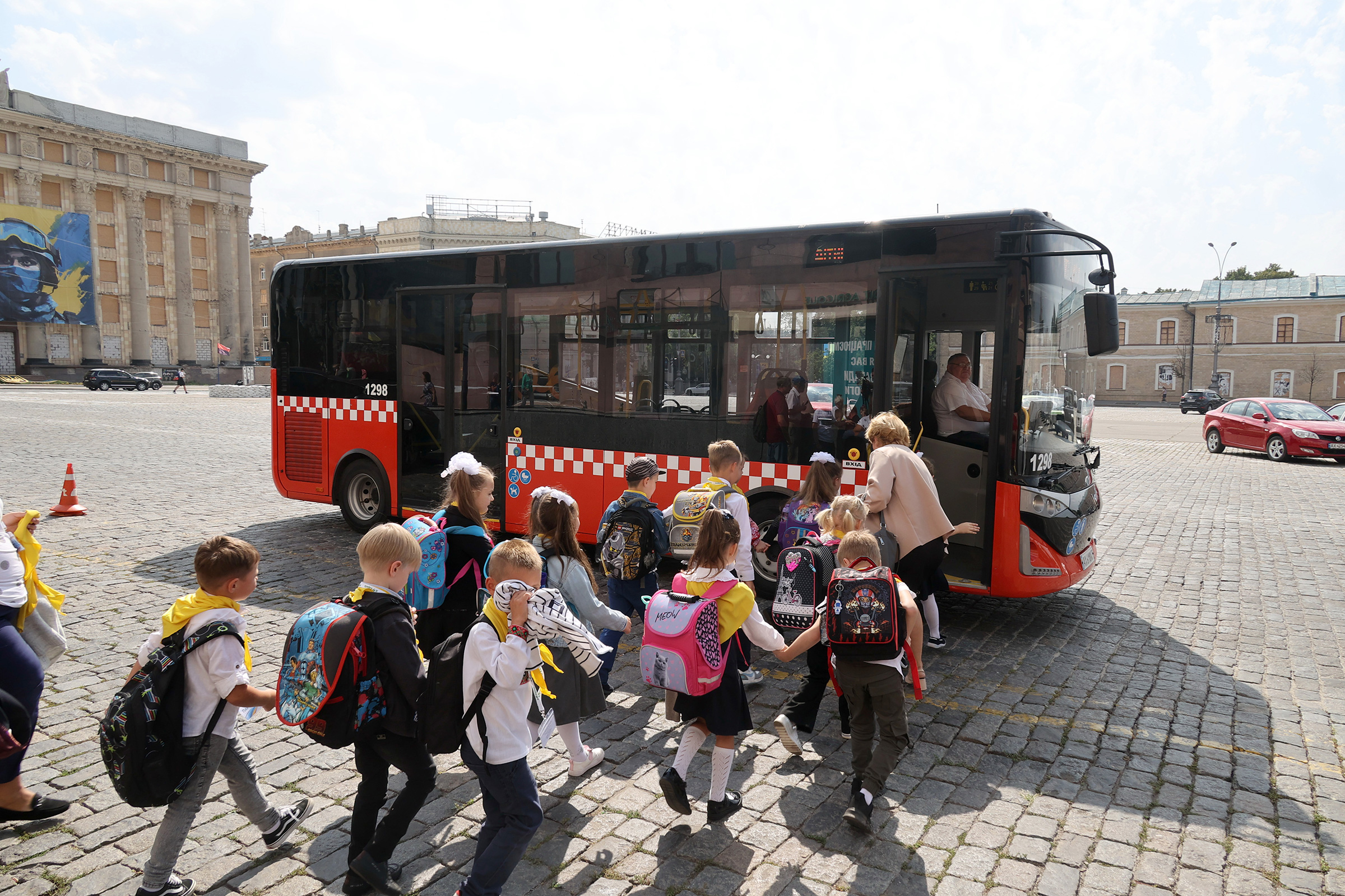 Ukraine School children board bus