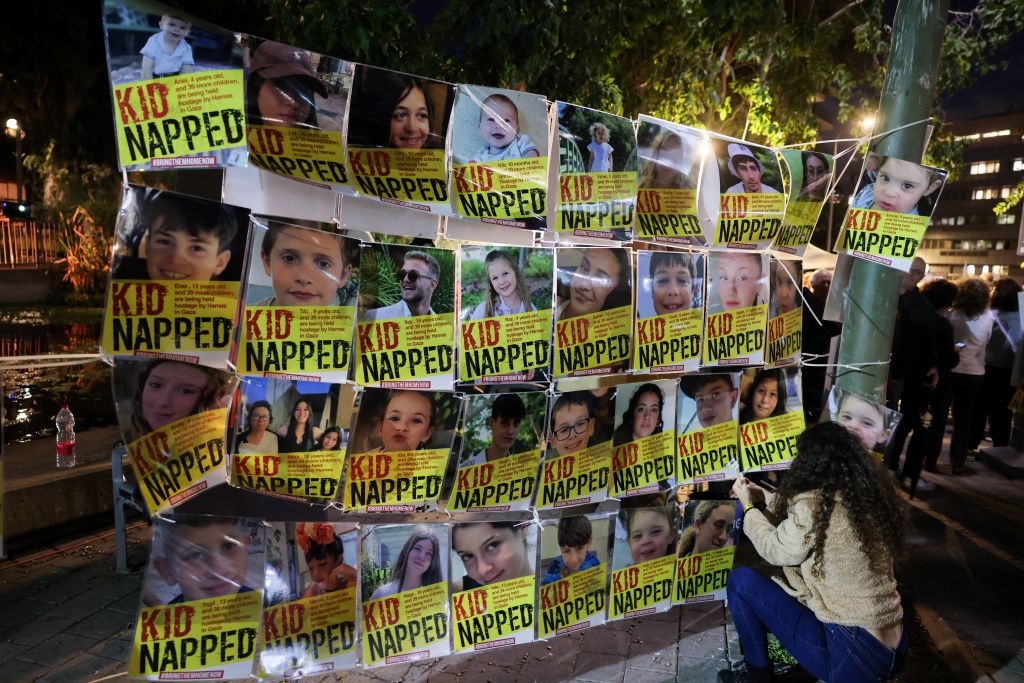 Portraits of Israeli children hostages are displayed during a rally outside the Unicef offices in Tel Aviv on Nov. 20, 2023 to demand the release of Israelis held hostage in Gaza since the Oct. 7 attack by Hamas militants, amid ongoing battles between Israel and the Palestinian armed group.
