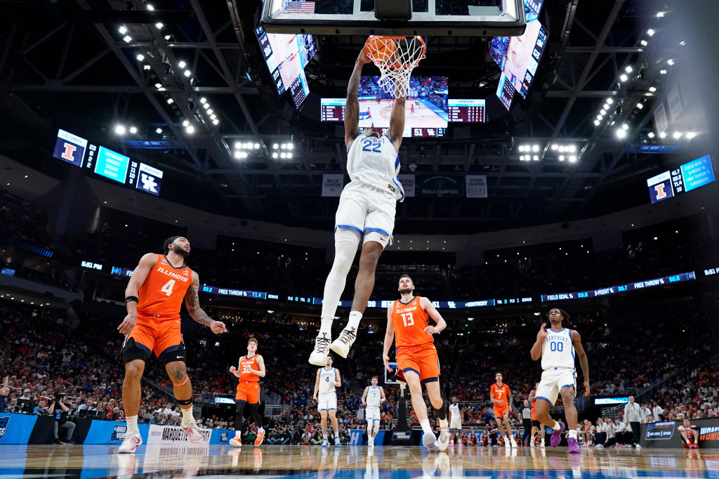 Amari Williams #22 of the Kentucky Wildcats dunks against the Illinois Fighting Illini during the second round of the 2025 NCAA Men's Basketball Tournament held at Fiserv Forum in Milwaukee, Wis. on March 23, 2025.