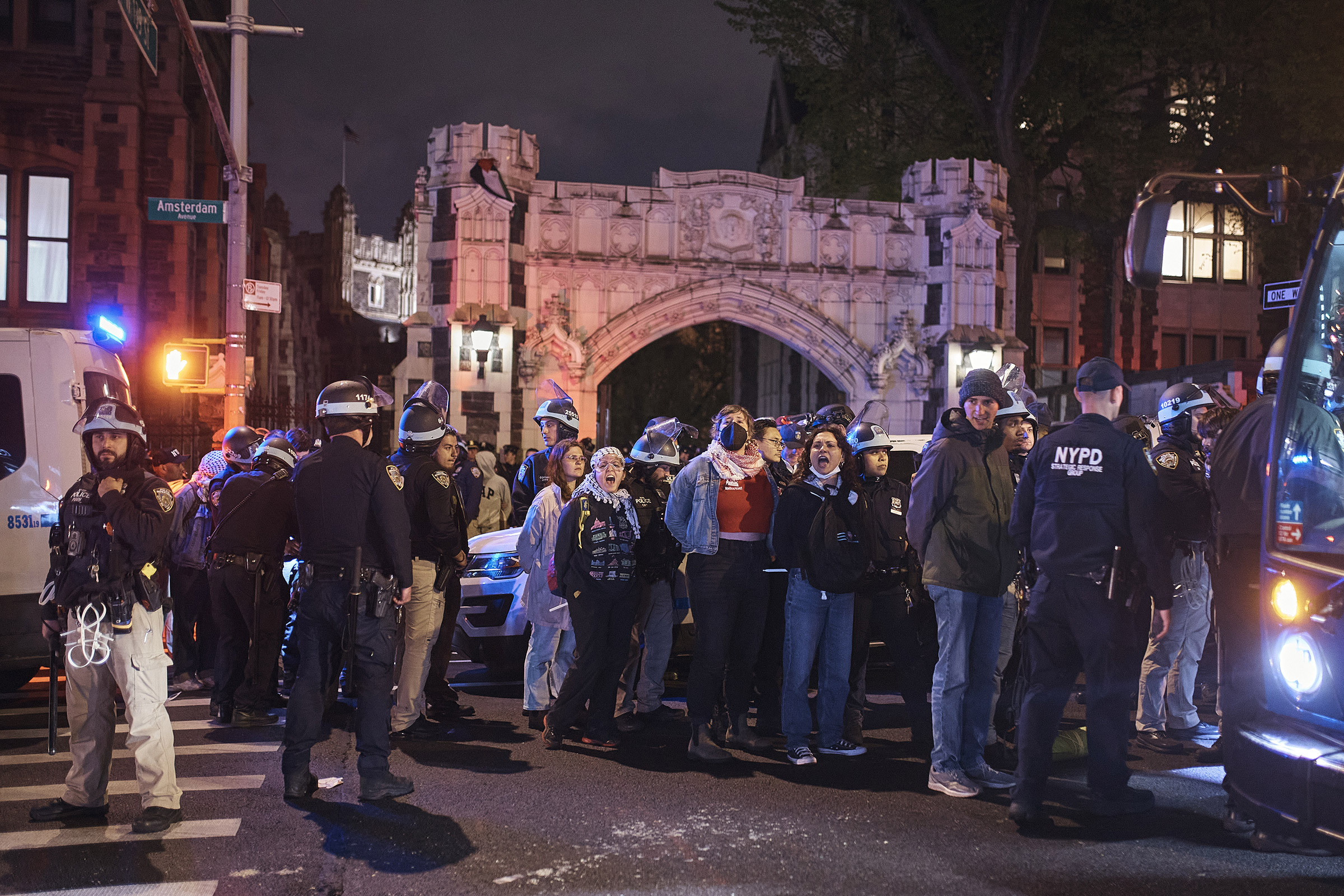 Police load arrested protestors onto buses in front of the CUNY City College of New York in New York City, on May 1, 2024.