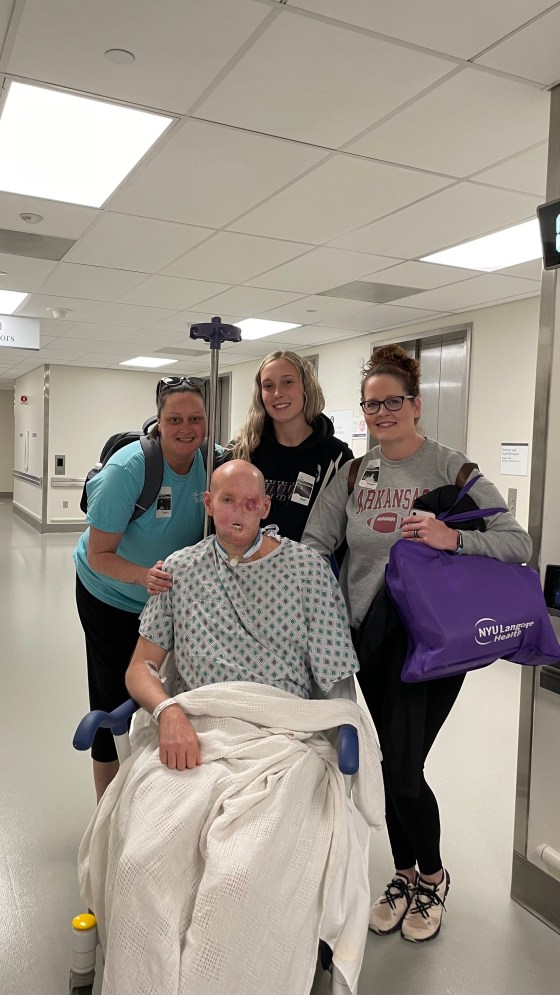 Aaron James with his family before surgery.