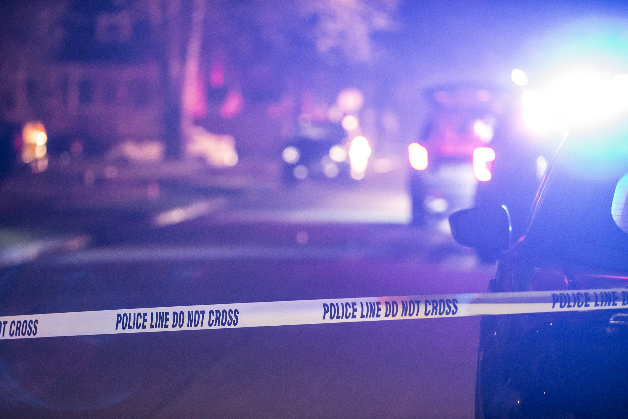 A crime scene is marked off with police tape