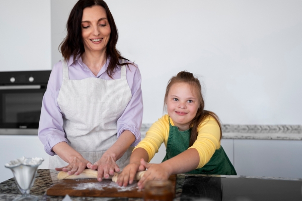 front view smiley woman girl cooking