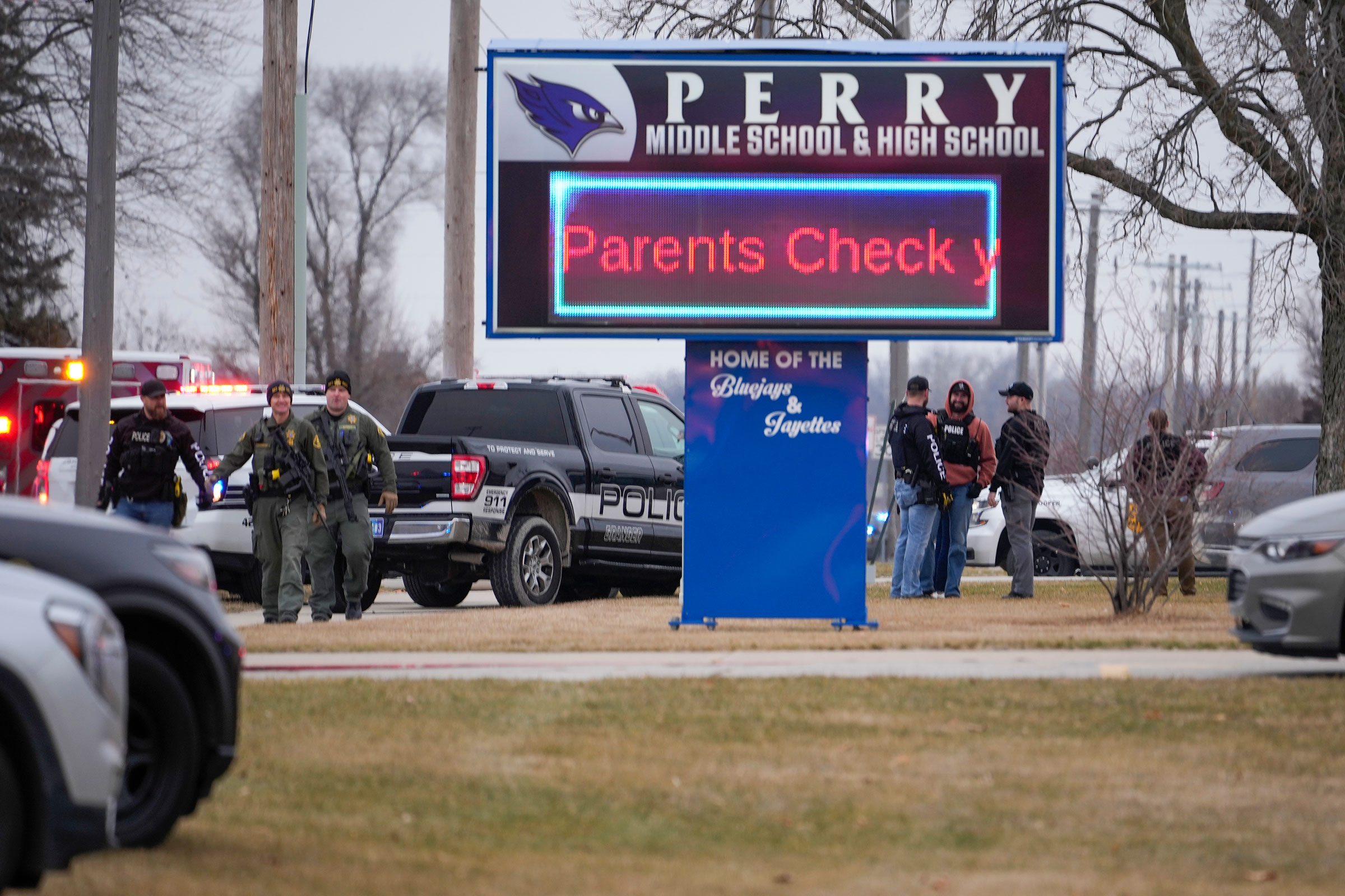 Police respond to Perry High School in Perry, Iowa., on Jan. 4, 2024. Police say there has been a shooting at the city's high school.