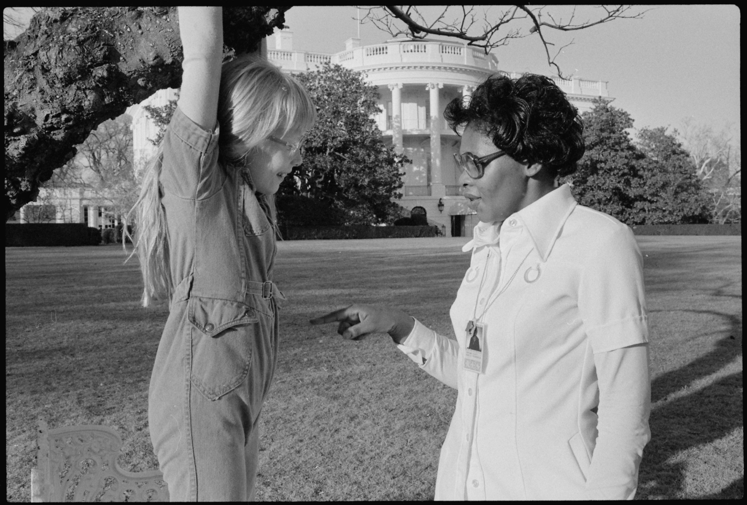 Amy Carter playing on the White House grounds with Mary Prince