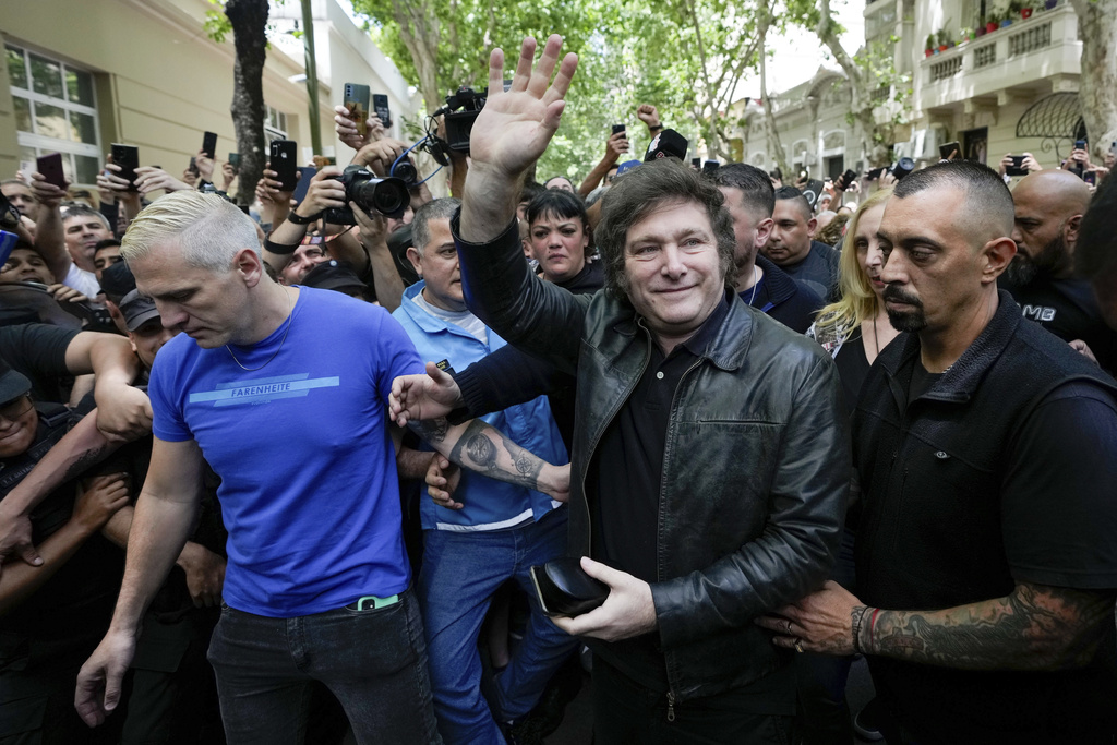 Presidential candidate of the Liberty Advances coalition Javier Milei arrives to vote in the presidential runoff election in Buenos Aires, Argentina, Sunday, Nov. 19, 2023.