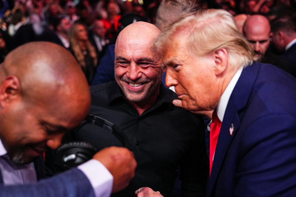 Joe Rogan and President Donald Trump talk during the UFC 309 event at Madison Square Garden in New York City on Nov. 16, 2024.