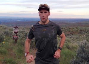 Steve Graepel trail running wearing a La Sportive Peak T-shirt. Source https://gearjunkie.com/gym-bag-stink-test-poligiene-treated-t-shirt