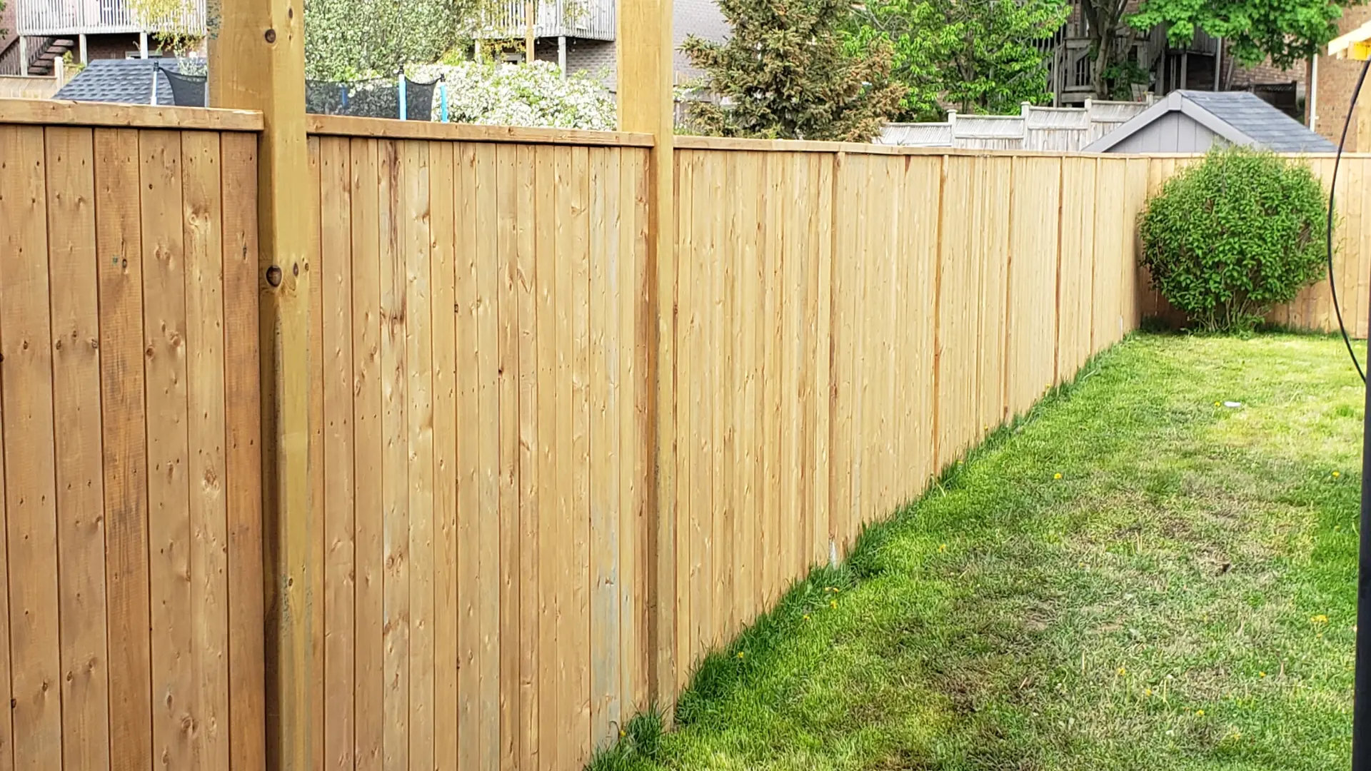 what colour fence paint makes garden bigger
