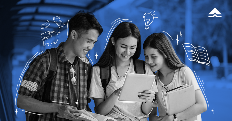 Three students looking at a piece of paper