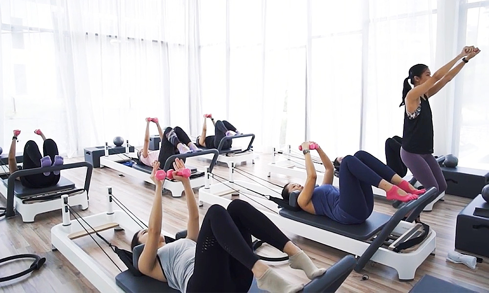 #FitnessFriday: Team tries Reformer Dynamic at The Flow