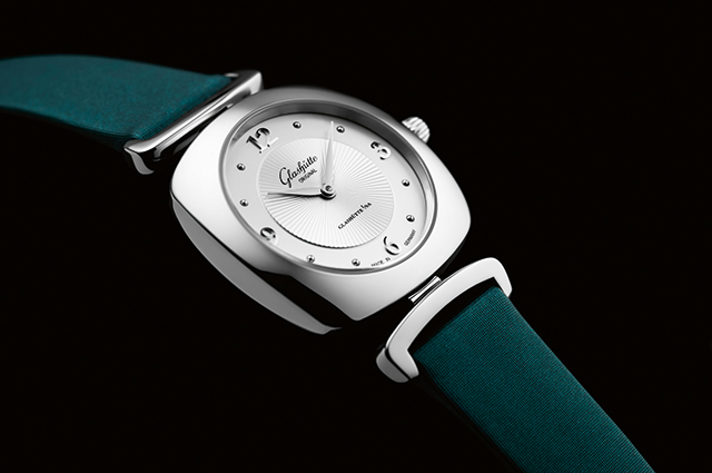 Pavonina Stainless Steel in petrol Roma-satin strap and galvanized silver dial