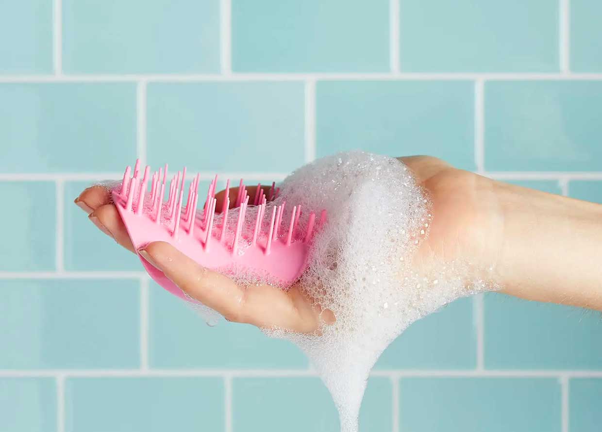 Why you need a scalp brush now (and where to shop them)