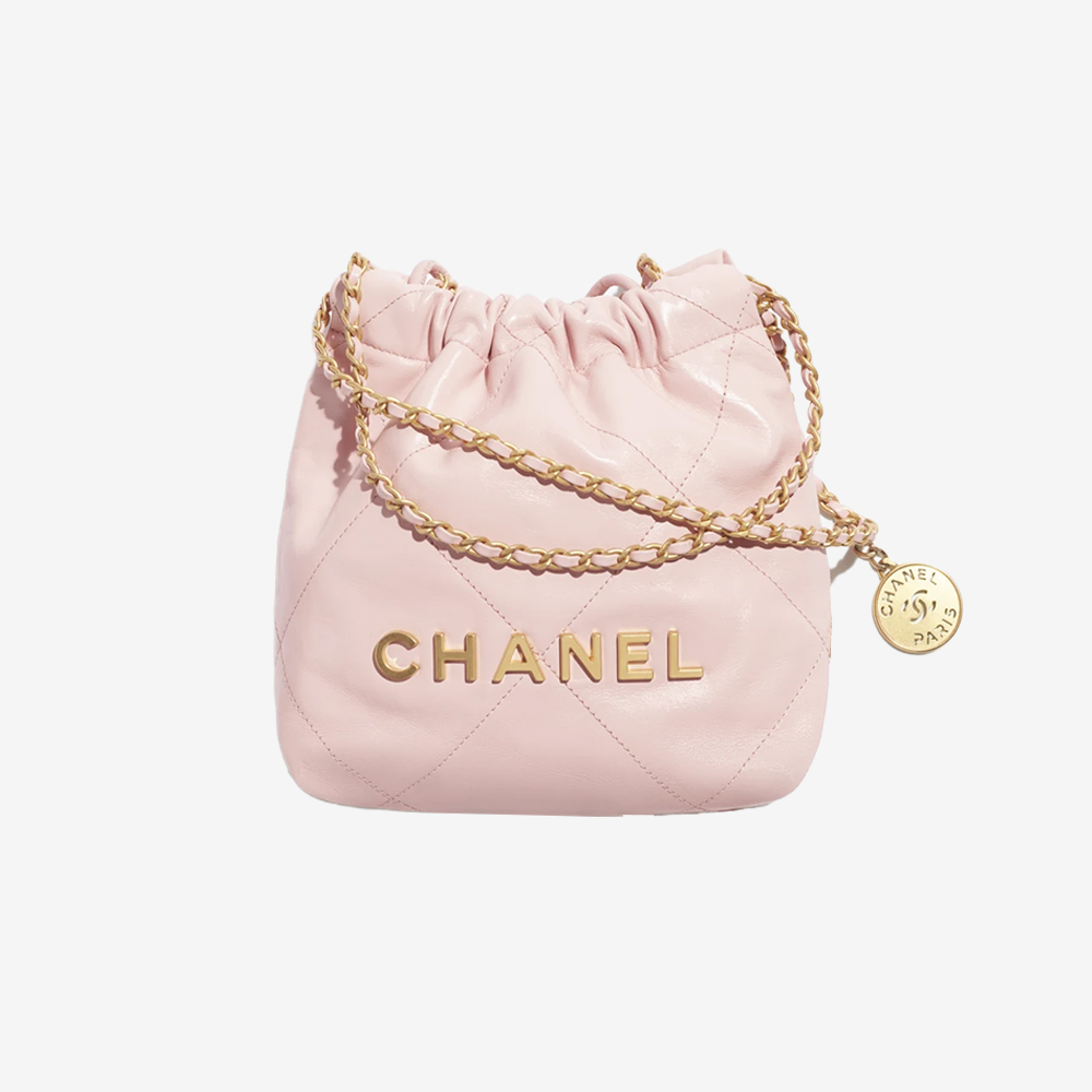 Lot - A Chanel vintage quilted ivory calfskin mini bucket bag