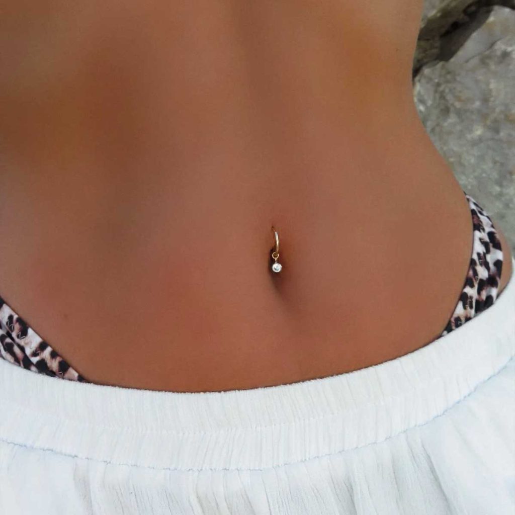 How old do you have to on sale be to have belly button pierced