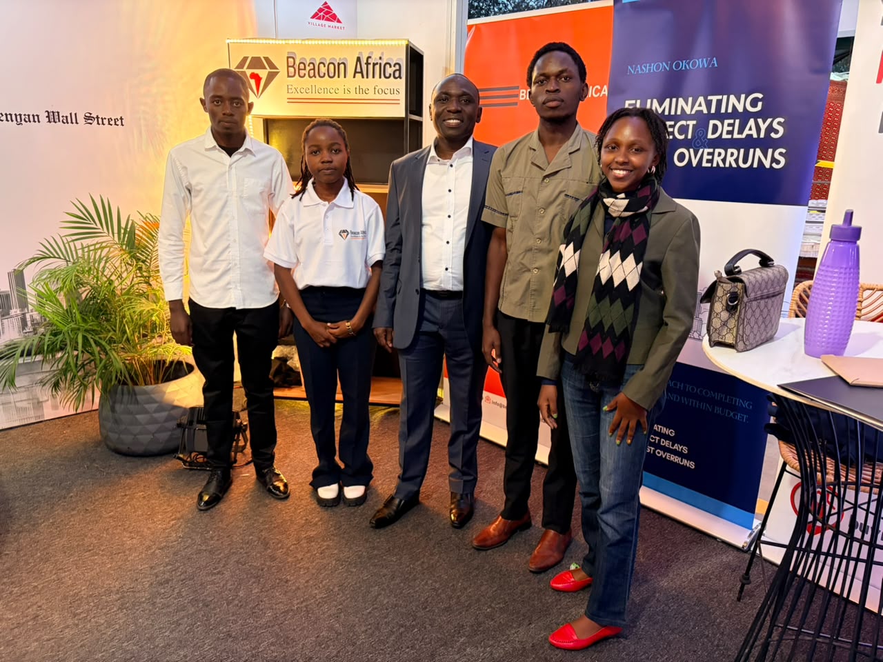 The author with the Beacon Africa team and Nashon Okowa at their exhibition booth at the Luxury Living and Design Expo