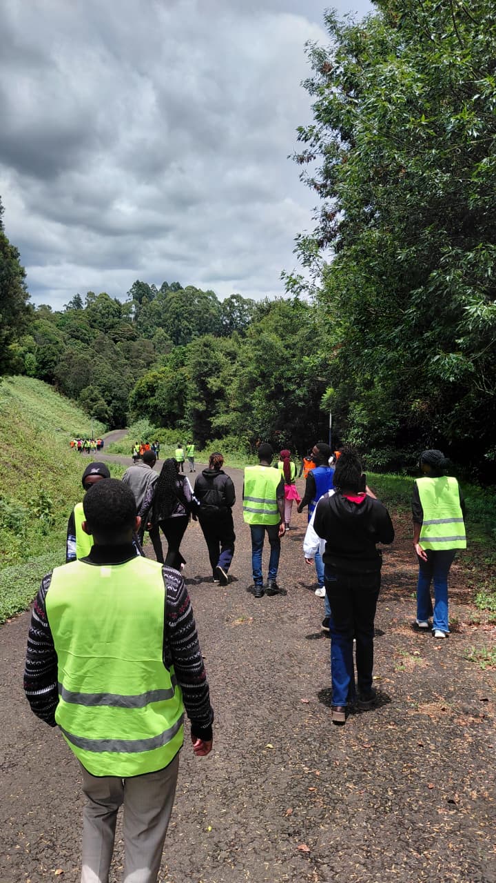 The group along the dam embankment overlooking the reservoir