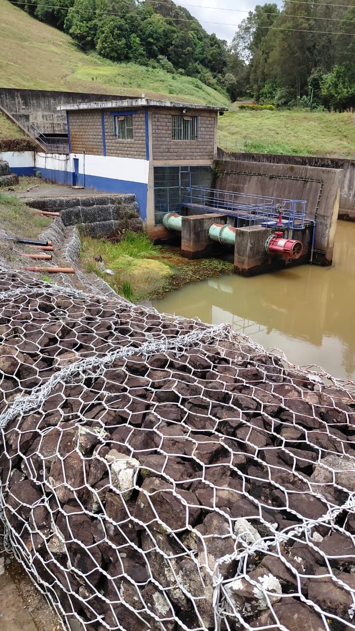 The dam's intake structure and gabion-reinforced embankment